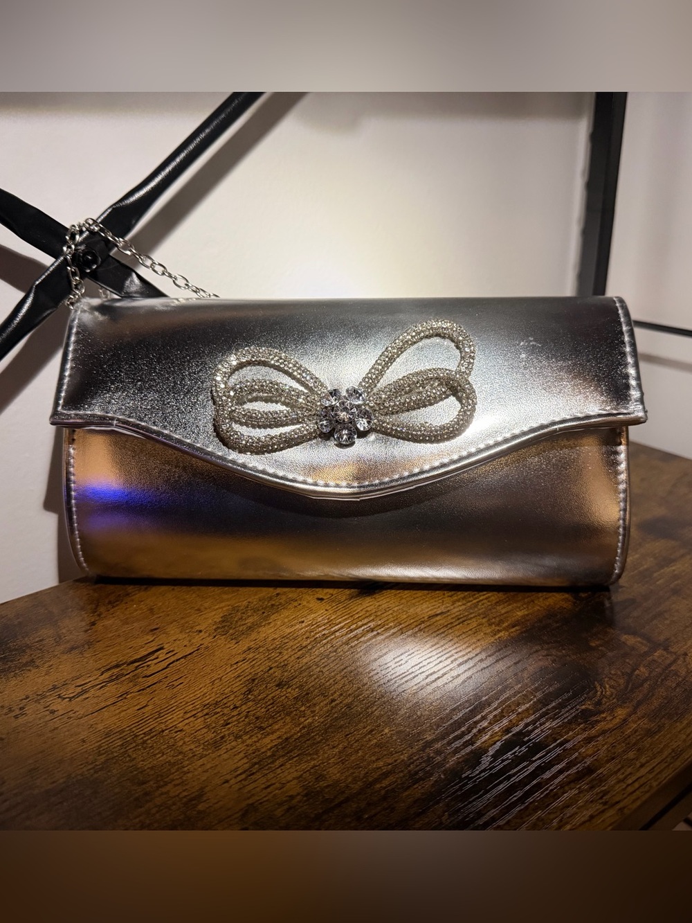 Silver Metallic Evening Clutch with Crystal Bow Detail